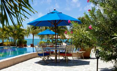 Chabil Mar Belize Resort Nth Pool with Table and Umbrellas